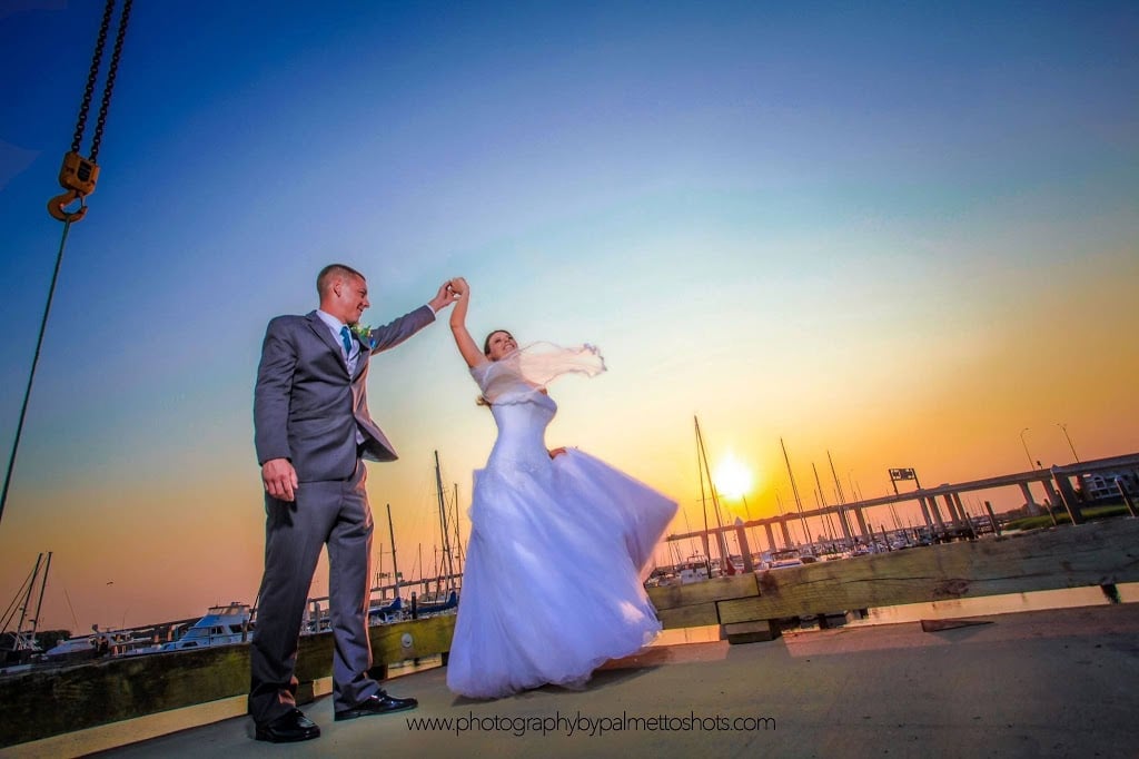 bride and groom on dock