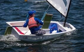 Opti Sailor on the water