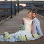 bride and groom on dock